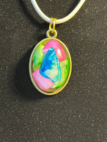 Pink, blue and green rock inlaid stone, gold oval shaped pendant necklace